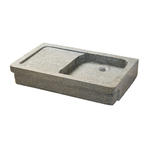 Lavabo da appoggio - PANGEA - in granito / con piano integrato / rettangolare