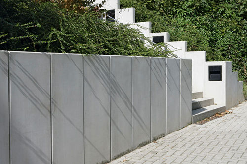 Blocco di calcestruzzo pieno - L - UHL - per muro / per recinzione di giardino