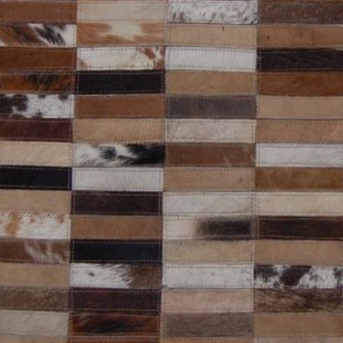 Tappeto contemporaneo - CIGARS - Nash Andrea - con motivi geometrici / in pelle di mucca / fatto a mano