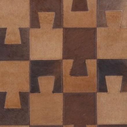 Tappeto contemporaneo - PUZZLE - Nash Andrea - con motivi geometrici / in pelle di mucca / fatto a mano