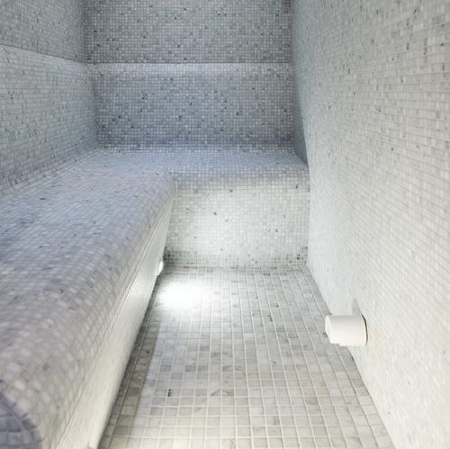 Panca contemporanea - TILEABLE - Cleopatra World of Wellness - in cemento / con schienale / senza braccioli
