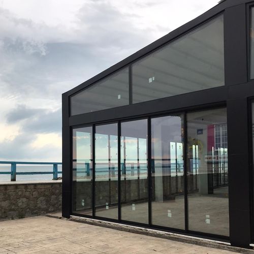 Vetrata scorrevole impilabile - WITH THRESHOLD - BKS balcony glazing systems - in alluminio / a 3 ante / a 2 ante