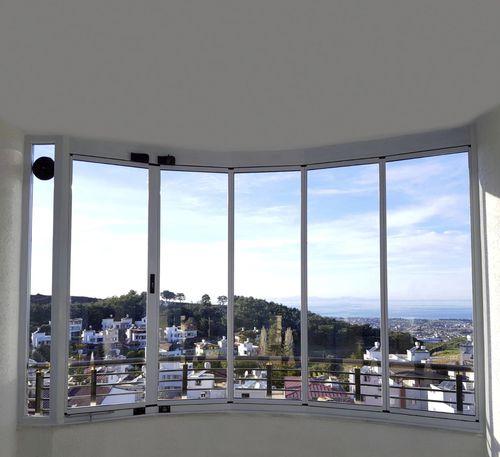 Vetrata a libro - ICS FOLDING SYSTEM - BKS balcony glazing systems - in alluminio / a doppi vetri / a 3 ante