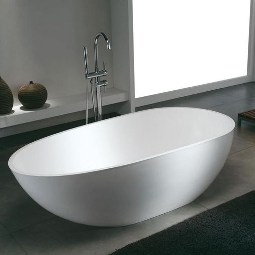 Vasca da bagno ovale - STOCKHOLM - STANO - ad isola / in Corian® / doppia