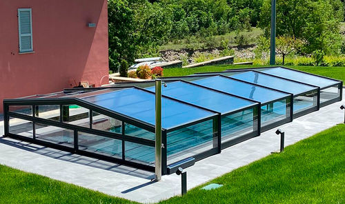Copertura per piscina bassa - Tarraco - COVERTTO - telescopica / in policarbonato / con azionamento manuale