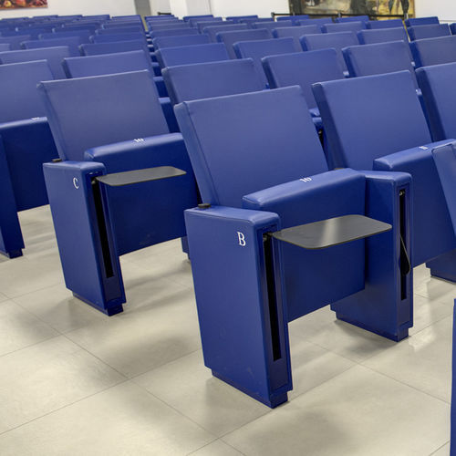 Poltrona per auditorium contemporanea - CROCIERA - Cinearredo Italia - in pelle / in legno compensato / pieghevole