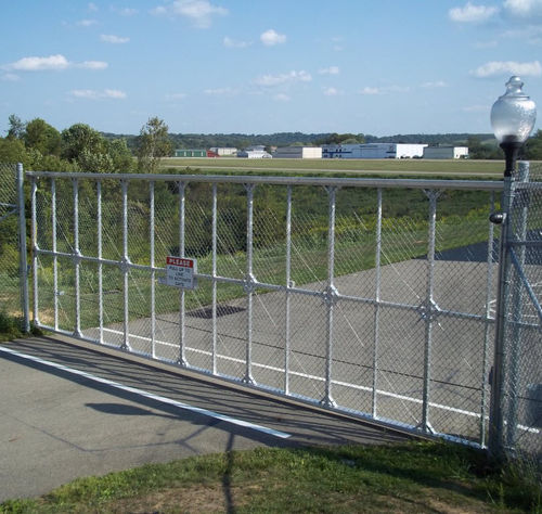 Cancello scorrevole - FORTRESS STRUCTURAL - Tymetal Corp - in lega d'alluminio / a sbarre / in rete metallica