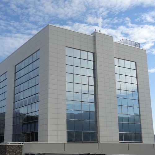Rivestimento di facciata a cassetta - Cantori srl - in metallo / liscio / di grande formato
