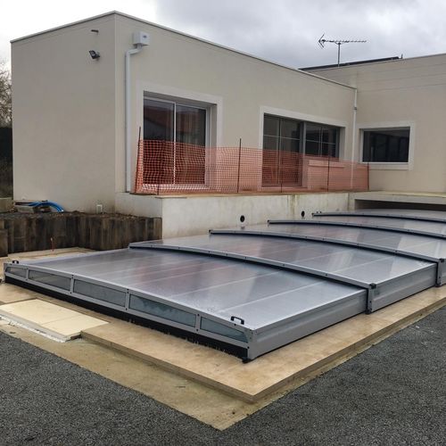 Copertura per piscina bassa - JULIA - planetabri - telescopica / in policarbonato / con azionamento manuale