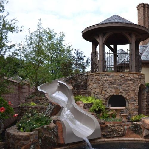 Scivolo acquatico girevole - American Aqua Works - per parco giochi / per parco acquatico / per piscina pubblica