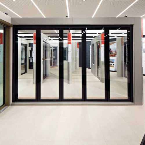 Vetrata a libro - FIN-Fold - Finstral - in PVC / a doppi vetri / a tripli vetri
