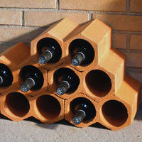 Portabottiglie in terracotta - STORAGE BRICKS - Cerámica Verea, S.A. - a pavimento / arancione