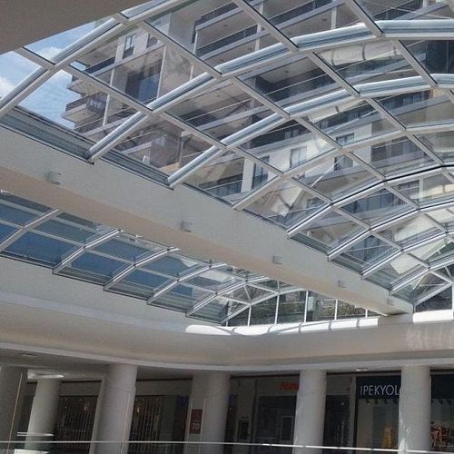 Copertura vetrata in alluminio - CLEARSKY - Evergreen Solutions - in acciaio / a motore / a doppi vetri