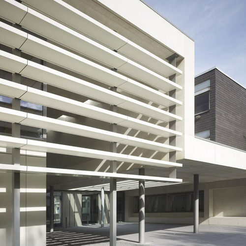 Frangisole in composito - SECONDARY SCHOOL WARENDORF - ALUCOBOND - in alluminio / per facciata / verticale