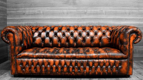 Divano chesterfield - ORANGE - Harleq - in pelle / arancione / in faggio