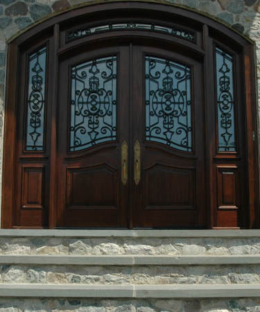 Porta d'ingresso - WN-28 - Granddoors - in mogano / in ferro modellato / battente