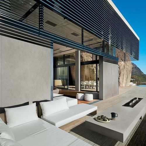 Rivestimento di facciata in pannelli - CONCRETE LIGHT   - Infinity surfaces - in gres porcellanato / verticale / opaco