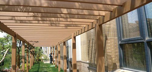 Pergola autoportante - TRADITIONAL - Protechwood International Limited - in legno composito / con copertura in legno / contract