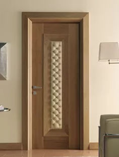 Porta da interno - INSERTED - James Solomon Ltd - in noce / in pelle / battente