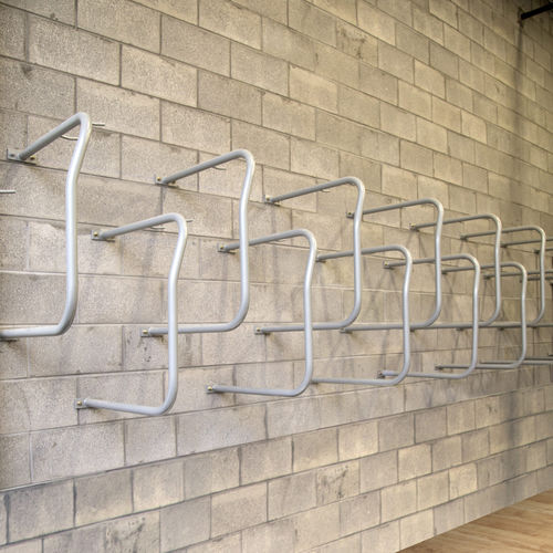 Rastrelliera per biciclette a muro - CYCLA SINGLE-UP - CIVIQ - verticale / per garage / per spazi pubblici
