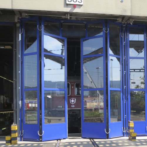 Porta industriale a libro - STRONG - Schneider Torsysteme - in acciaio / automatica / di sicurezza