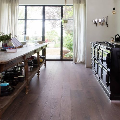 Pavimento laminato in rovere - GYANT BRUN FONCÉ - Décoplus Parquets - da incollare / aspetto legno / per uso residenziale