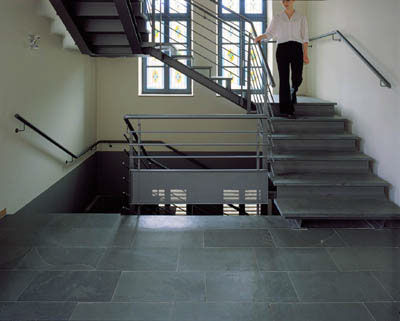 Scala a U - MONTAUK - BELTRAMI NV - con gradini in calcestruzzo / con struttura in metallo / contemporanea