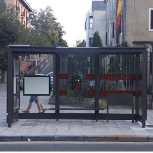Pensilina per fermata d'autobus in vetro - IRUN - Primur - con panchina / con pannelli fotovoltaici integrati