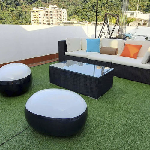 Pouf contemporaneo - PEBBLE - ALVARAE Design Studio - in fibra di carbonio / tondo / da esterno
