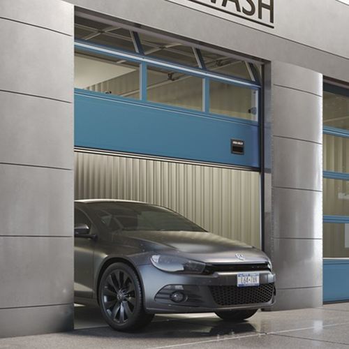 Porta industriale sezionale - OH1042DD - ASSA ABLOY Entrance Systems - in lamiera d'acciaio / automatica / di sicurezza