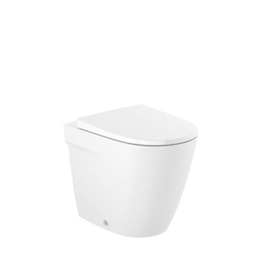 WC da appoggio - Ona - ROCA - in porcellana / per uso residenziale / ovale