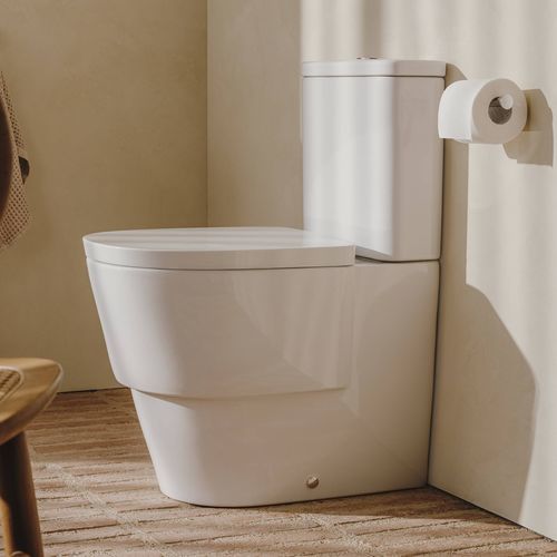 WC da appoggio - TURA - ROCA - in ceramica / per uso residenziale / rotondo