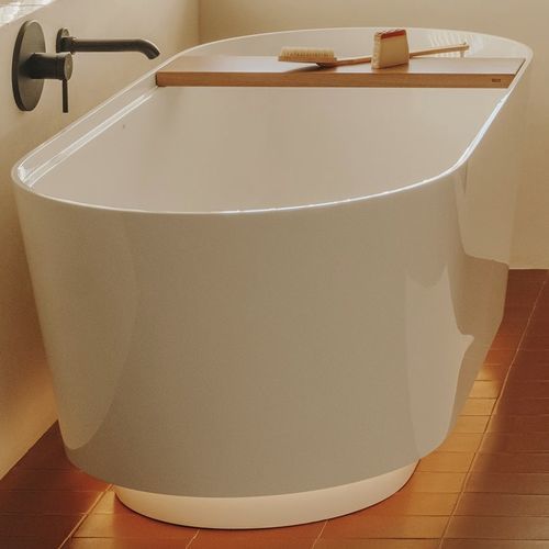 Vasca da bagno ovale - TURA - ROCA - ad isola / per ambiente abitativo / in ceramica