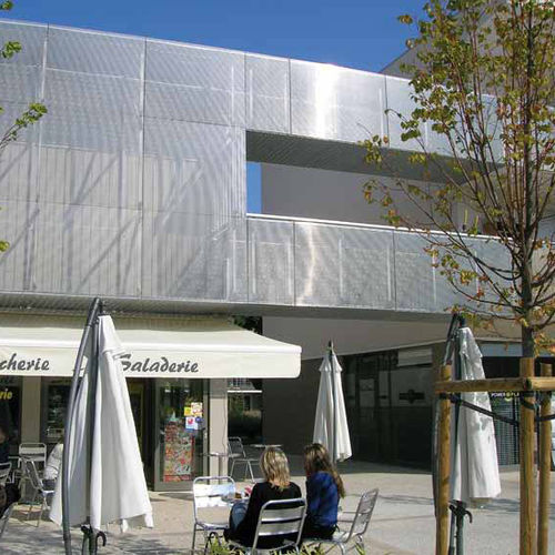 Rivestimento di facciata in griglia - ANDRITZ EUROSLOT - ANDRITZ EUROSLOT Architecture - in metallo / verticale / testurizzato