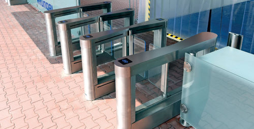 Varco rapido per ad alta capacità di flusso - SPEEDSTILE FL OUTDOOR - GUNNEBO ENTRANCE CONTROL - in vetro / di sicurezza / in alluminio