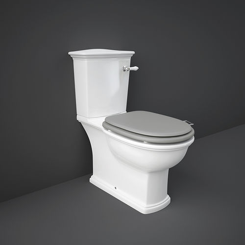 WC da appoggio - RAK-Washington - RAK Ceramics - in ceramica / con maniglia a leva / con cassetta a zaino