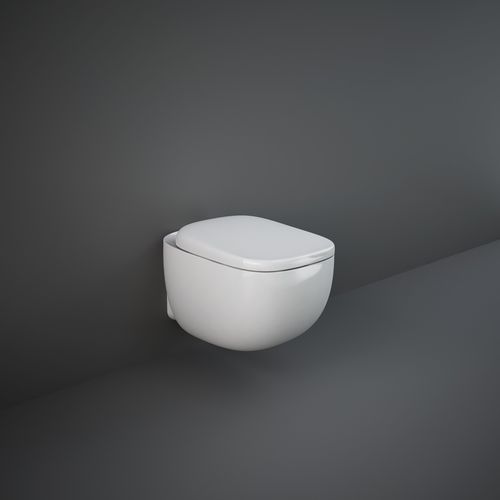 WC sospeso - RAK-ILLUSION - RAK Ceramics - in ceramica / con cassetta ad incasso / senza brida