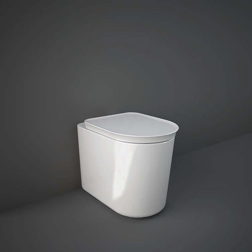 WC da appoggio - RAK-VALET - RAK Ceramics - filomuro / in ceramica / di Patrick Norguet