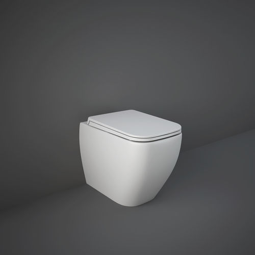 WC da appoggio - RAK-FEELING - RAK Ceramics - filomuro / in ceramica / per uso residenziale