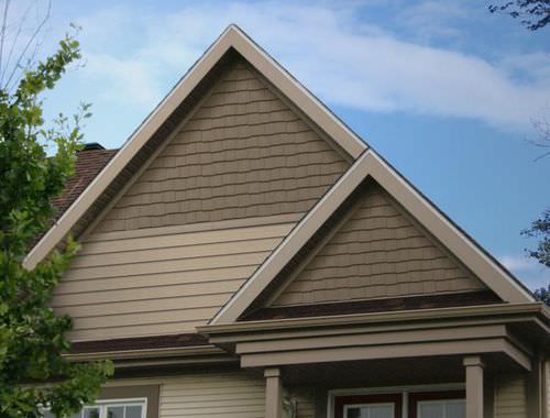 Rivestimento di facciata in pannelli - NOVISHAKE™ SE - NOVIK - polimerico / dipinto / aspetto legno