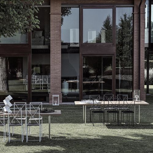 Tavolo da pranzo moderno - LEVANTE - FLEXFORM - in legno massiccio / in iroko / in acciaio inossidabile
