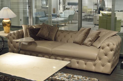 Divano chesterfield - BOA - Stone International - in pelle / con braccioli / con cuscino rimovibile