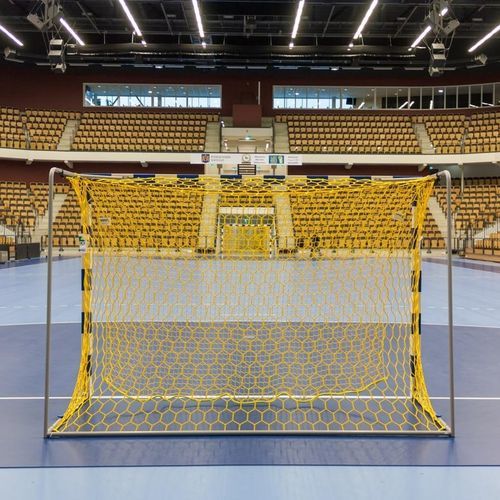 Porta da pallamano in polipropilene - 111 - SPORT TRANSFER Sp. z o.o. - gialla / trapezoidale / a maglia esagonale