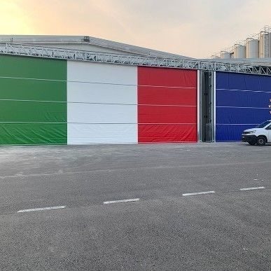 Porta industriale sezionale laterale - SPEEDY  - Moreschi Chiusure Industriali S.r.l. - in acciaio / in PVC / in tessuto