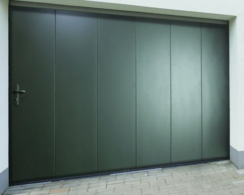 Porta da garage in acciaio termolaccato - USINE-ONLINE - sezionale laterale / in schiuma di poliuretano / manuale