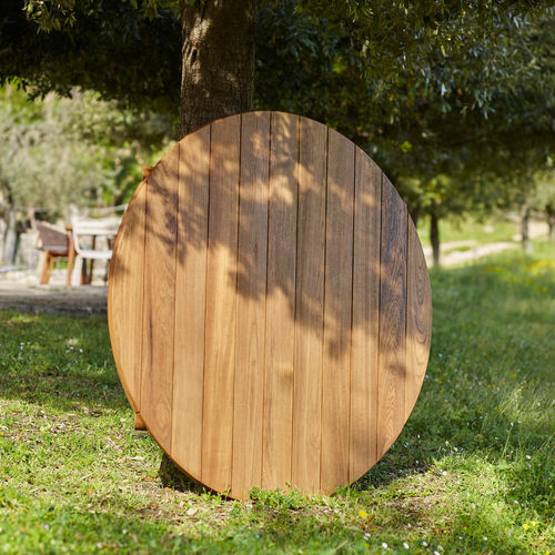 Tavolo design - UZ - Yaaz - in teak / con supporto in teak / rotondo