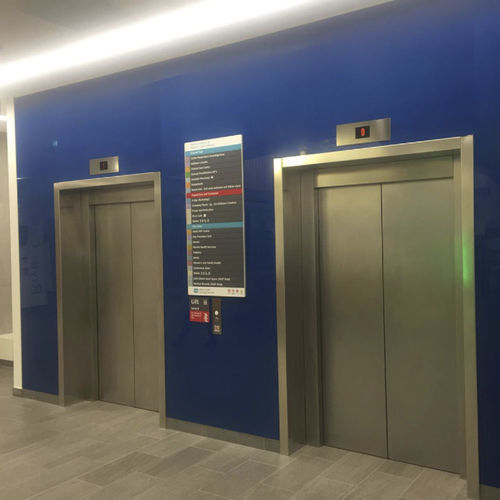 Rivestimento murale per interni - Specialist Joinery Group - in vetro / levigato / a specchio