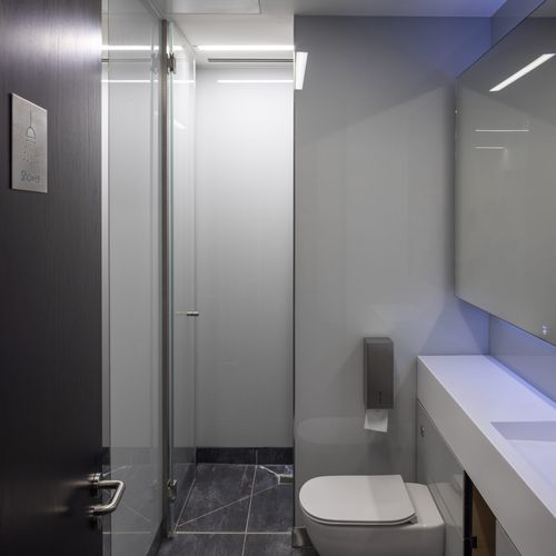 Cabina per bagni pubblici in vetro - Specialist Joinery Group - per toilette / per edifici pubblici / resistente all'umidità
