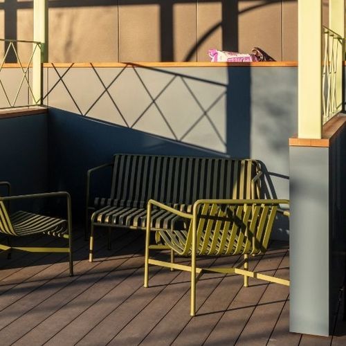 Divano contemporaneo - Specialist Joinery Group - per terrazza / in metallo / con braccioli