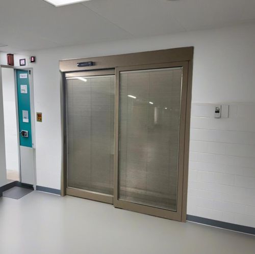 Porta d'ingresso - ICAT® ICU - RSA Door Systems - in vetro / scorrevole / a libro